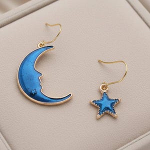 Mismatched Blue Crescent Moon and Star dangle earrings - - LadybugfeetDesigns -