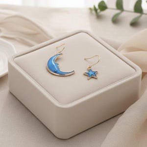 Mismatched Blue Crescent Moon and Star dangle earrings, Gold