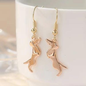 Dachshund dangle earrings. Gold - - LadybugfeetDesigns -