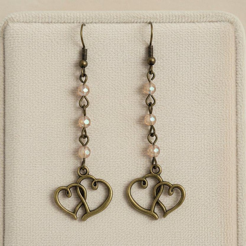 Antique Bronze Boho Double Heart dangle earrings - - LadybugfeetDesigns -