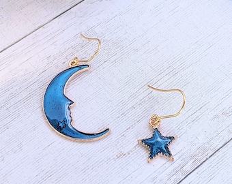 Mismatched Blue Crescent Moon and Star dangle earrings