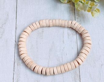 Pulsera elástica unisex con cuentas de madera Heishi color marfil