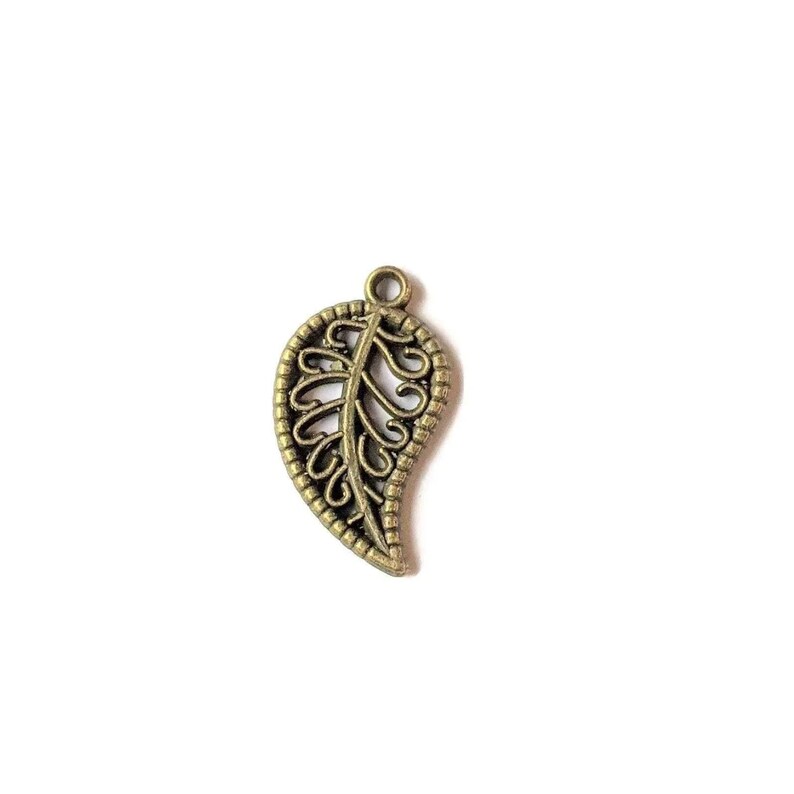 Antique Bronze Filigree Leaf Charm - - LadybugfeetDesigns -