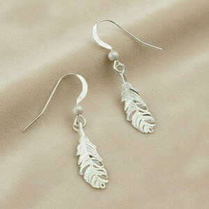 Feather Sterling Silver dangle earrings - - LadybugfeetDesigns -