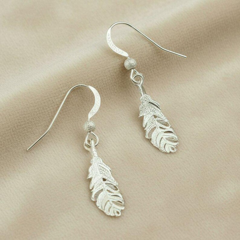 Feather Sterling Silver dangle earrings - - LadybugfeetDesigns -