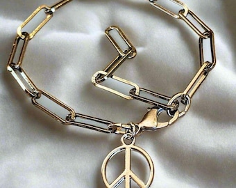Pulsera con cadena de clip de papel con el símbolo de la paz, color gris plomo.