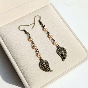 Antique Bronze Filigree Leaf dangle earrings - - LadybugfeetDesigns -