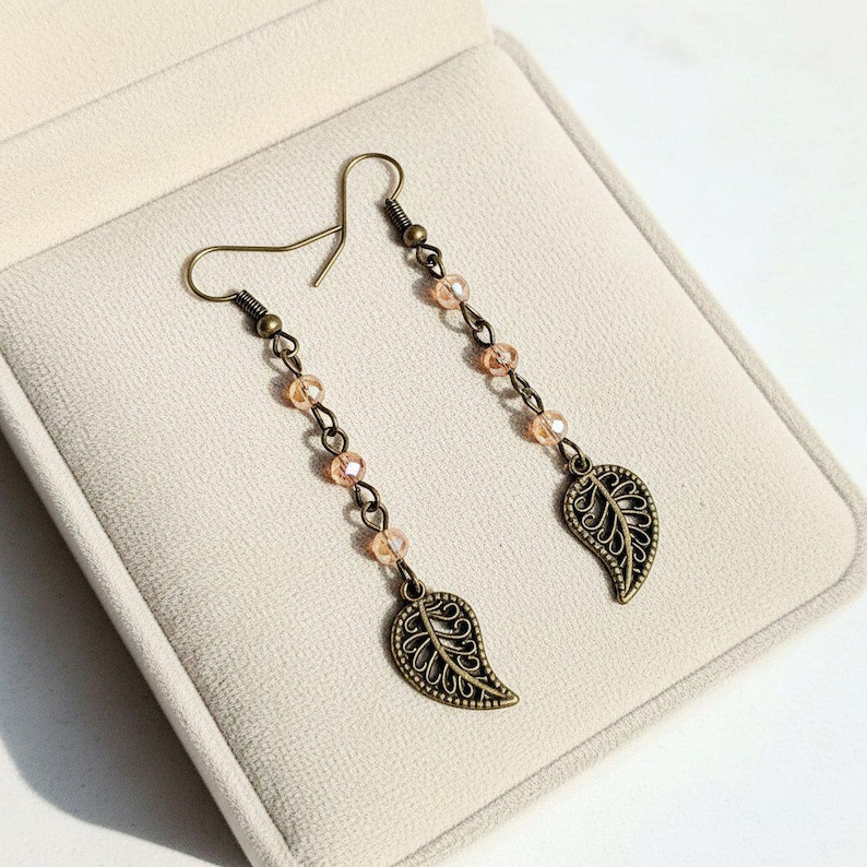 Antique Bronze Filigree Leaf dangle earrings - - LadybugfeetDesigns -