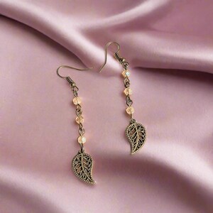 Antique Bronze Filigree Leaf dangle earrings - - LadybugfeetDesigns -
