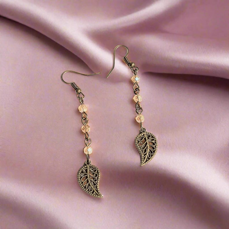 Antique Bronze Filigree Leaf dangle earrings - - LadybugfeetDesigns -