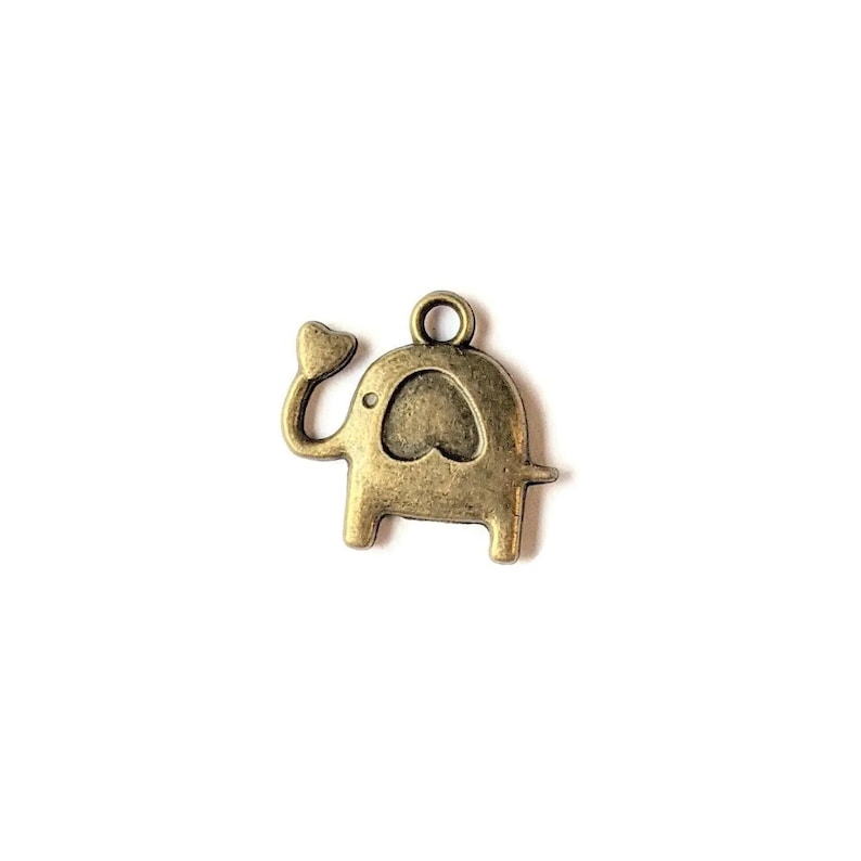 Antique Bronze Ornamental Elephant Head Charm - - LadybugfeetDesigns -