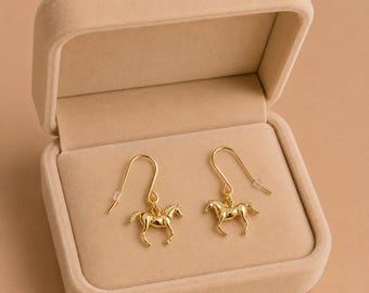 Horse dangle earrings, Gold