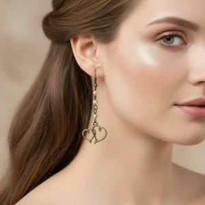 Antique Bronze Boho Double Heart dangle earrings - - LadybugfeetDesigns -