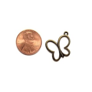 Antique Bronze Butterfly Cut-Out Charm - - LadybugfeetDesigns -