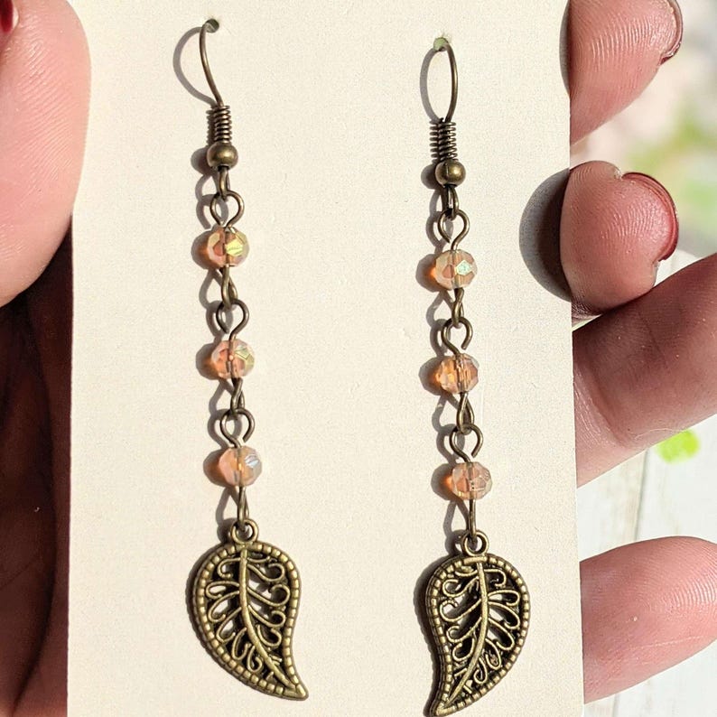 Antique Bronze Filigree Leaf dangle earrings - - LadybugfeetDesigns -