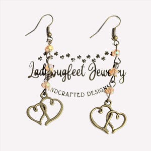 Antique Bronze Boho Double Heart dangle earrings - - LadybugfeetDesigns -