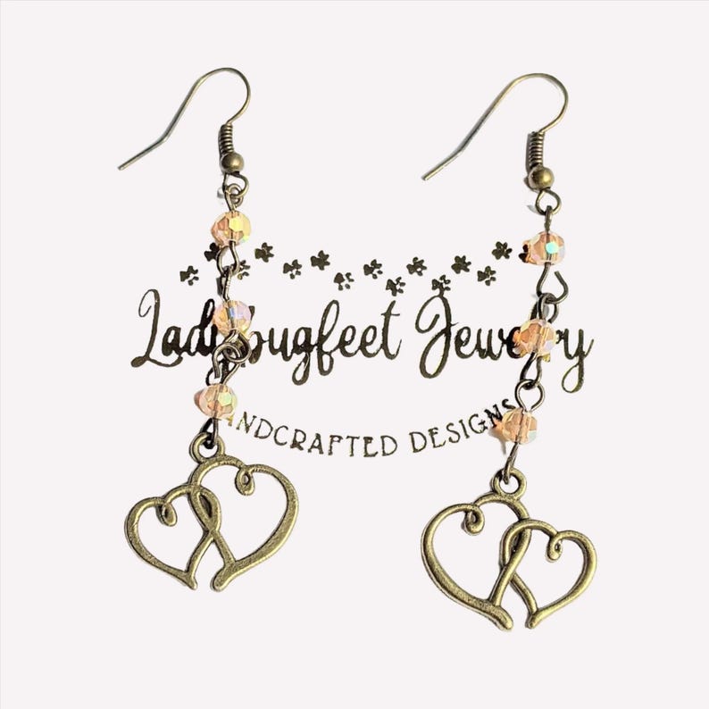 Antique Bronze Boho Double Heart dangle earrings - - LadybugfeetDesigns -