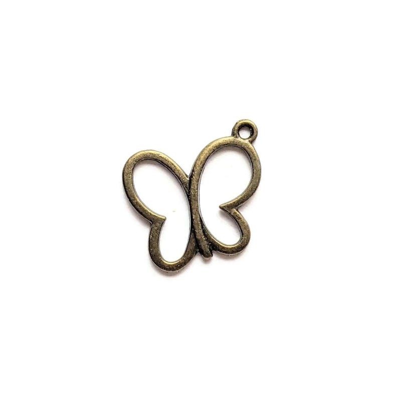 Antique Bronze Butterfly Cut-Out Charm - - LadybugfeetDesigns -