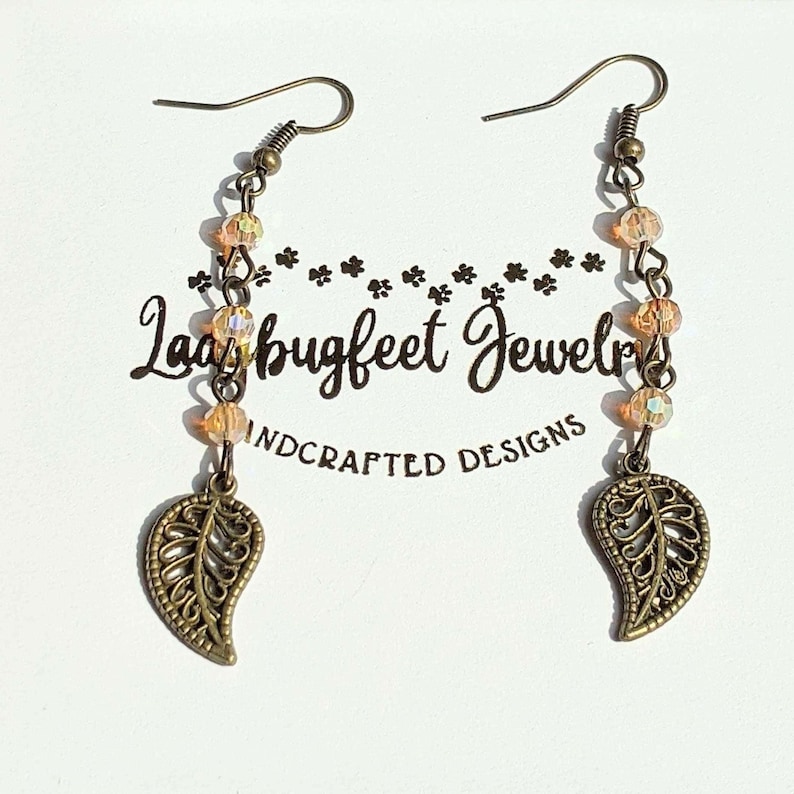 Antique Bronze Filigree Leaf dangle earrings - - LadybugfeetDesigns -