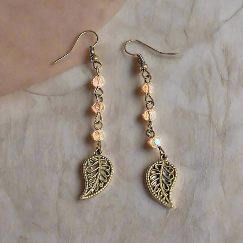 Antique Bronze Filigree Leaf dangle earrings - - LadybugfeetDesigns -