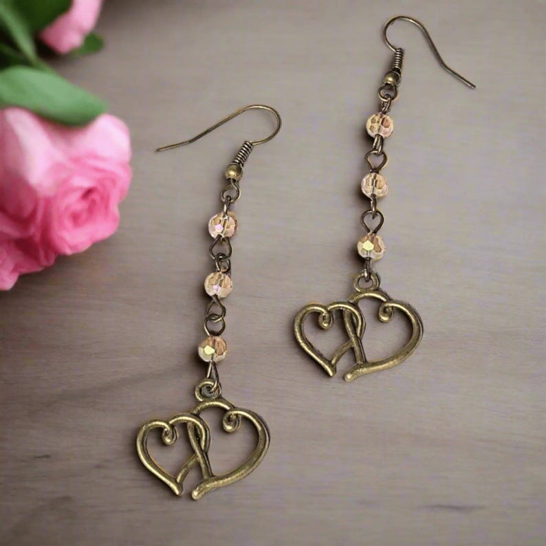 Antique Bronze Boho Double Heart dangle earrings - - LadybugfeetDesigns -
