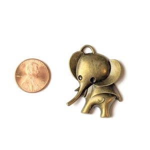 Large Antique Bronze Elephant Charm Pendant - - LadybugfeetDesigns -