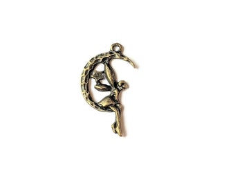 Antique Bronze Fairy on a Crescent Moon Charm