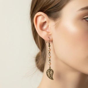 Antique Bronze Filigree Leaf dangle earrings - - LadybugfeetDesigns -
