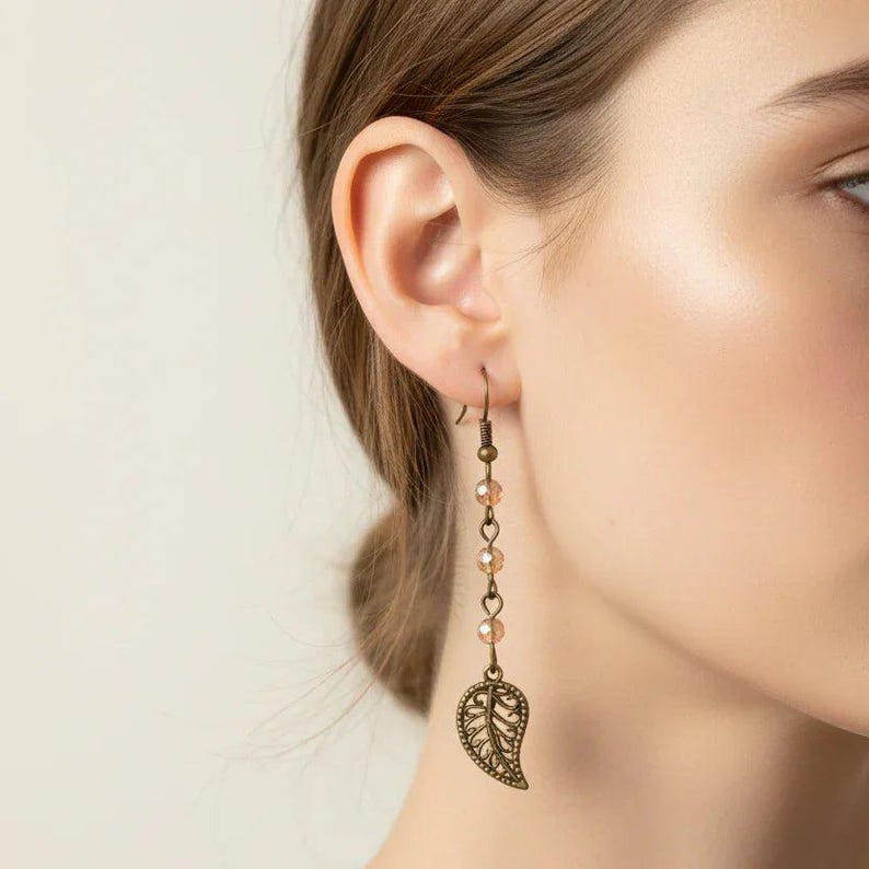 Antique Bronze Filigree Leaf dangle earrings - - LadybugfeetDesigns -
