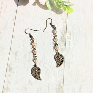 Antique Bronze Filigree Leaf dangle earrings - - LadybugfeetDesigns -