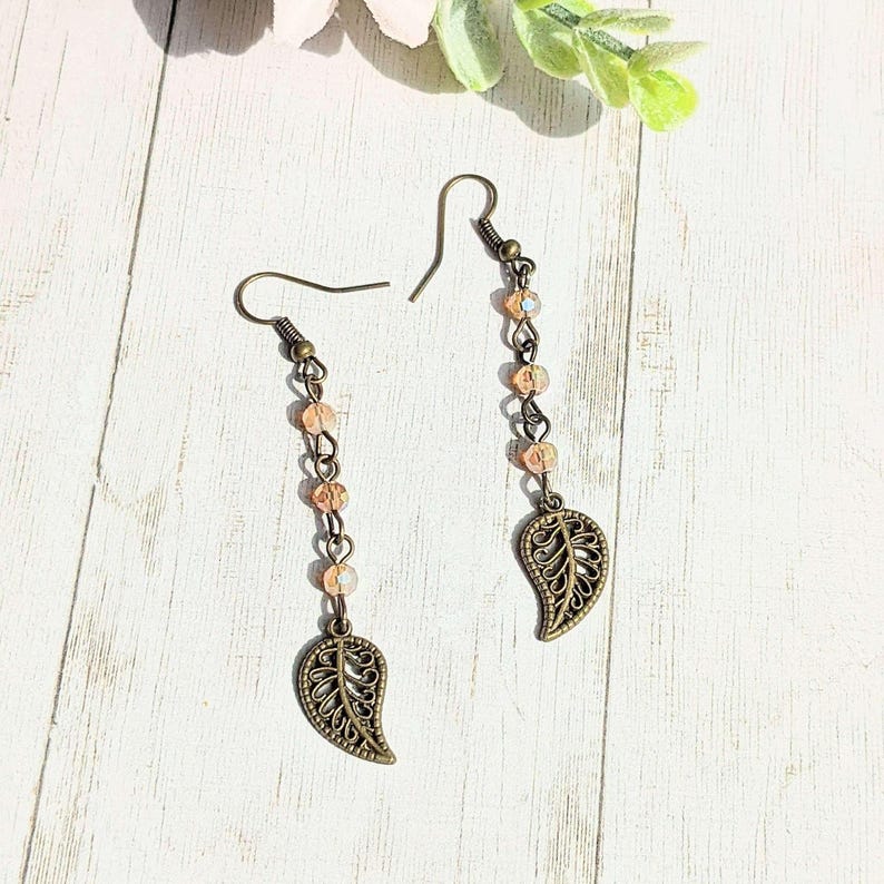 Antique Bronze Filigree Leaf dangle earrings - - LadybugfeetDesigns -