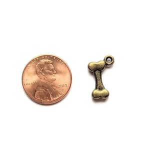 Antique Gold Dog Bone Charm - - LadybugfeetDesigns -