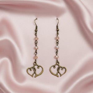 Antique Bronze Boho Double Heart dangle earrings - - LadybugfeetDesigns -