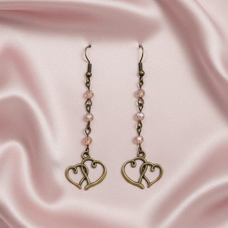 Antique Bronze Boho Double Heart dangle earrings - - LadybugfeetDesigns -