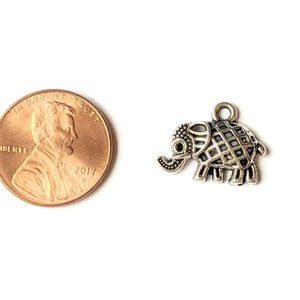 Tiny Silver Ornamental Elephant Charm - - LadybugfeetDesigns -
