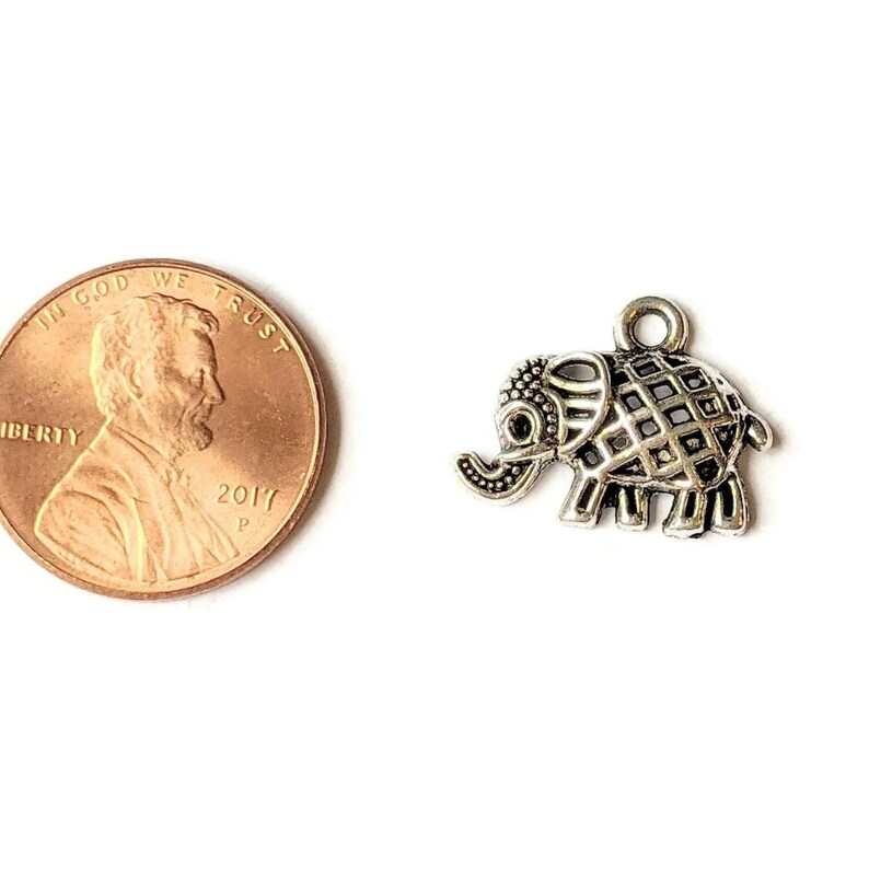 Tiny Silver Ornamental Elephant Charm - - LadybugfeetDesigns -