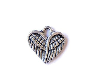 Tiny Silver Winged Heart Charm