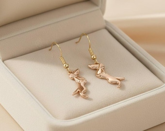 Dachshund dangle earrings. Gold