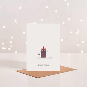 Grappige kattenkerstkaart | Woordspeling Santa Claws-feestdag
