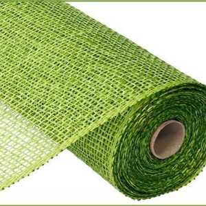 May include: A roll of green deco mesh with a woven texture. The mesh is rolled up and the end is visible.