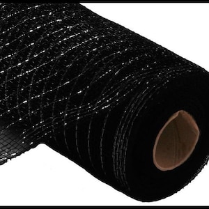 Könnte beinhalten: Eine Rolle schwarzes Netzband mit silbernem Glitzer. Das Band ist auf einer Papprolle aufgerollt.
