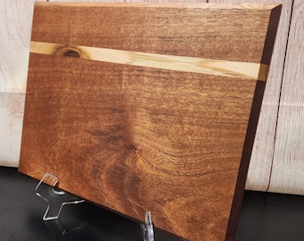 Sapele wood cutting board with a teak accent stripe