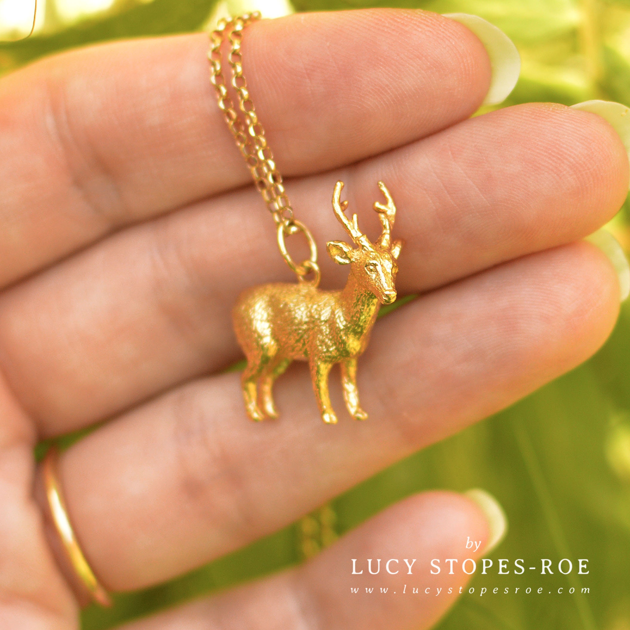 Gold deer best sale necklace