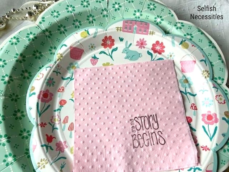 Hand stamped and embossed cocktail napkins with and the story begins.  Paired with springtime cottage and green whimsical plates for your event.