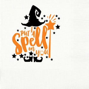 May include: White background with a Halloween-themed graphic. The design features a black witch hat, an orange star wand, and the phrase "Put a Spell on You" in orange. Black stars and witch shoe accents complete the design.