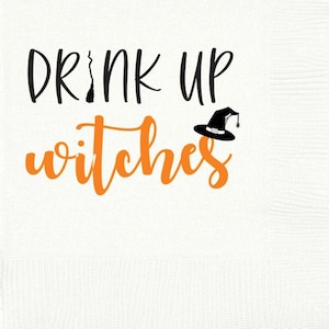 May include: White beverage napkin with the text "DRINK UP witches" in black and orange script. A black witch hat with a buckle and spider is to the right of the text. The napkin has a textured pattern.