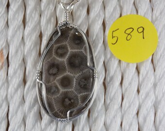 PP#589 Petoskey stone  wire wrapped with solid sterling silver.