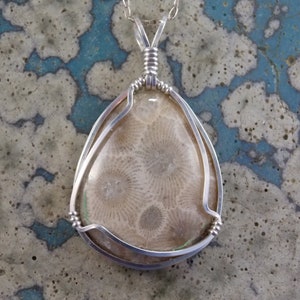 PP#542 SS Petoskey stone wire wrapped with solid sterling silver.