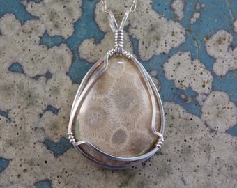 PP#542 SS Petoskey stone wire wrapped with solid sterling silver.
