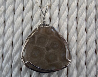 PP#494 SS Petoskey stone wire wrapped with solid sterling silver.